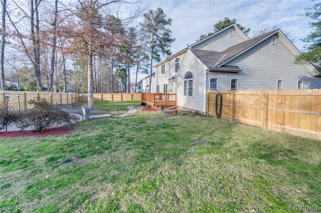 12124 Club Ridge Drive Chester, VA 23836 - Photo 39 of 40 Plenty of trees have been removed to create a n open level lot for family games