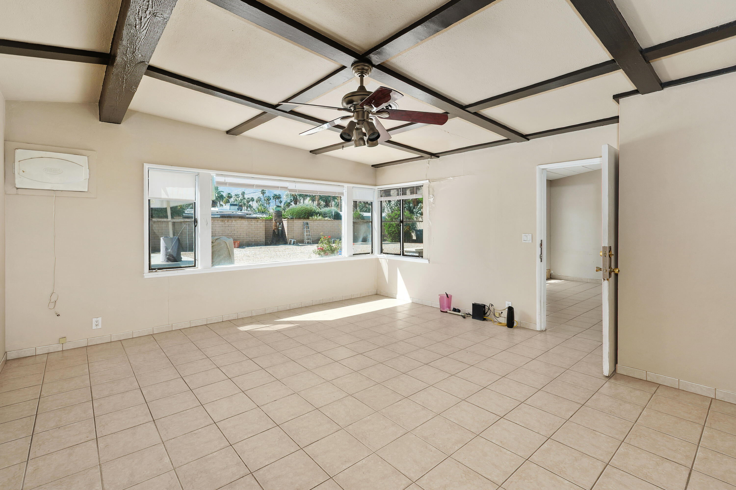 1077 South Riverside Drive Palm Springs, CA 92264 - Photo 13 of 35 a view of an empty room with a window