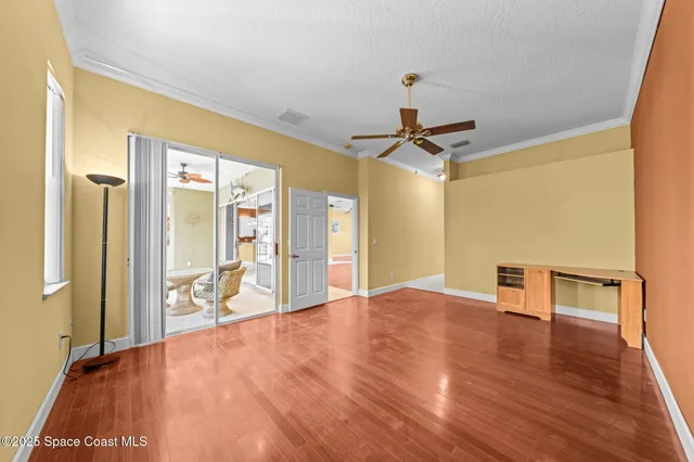a bathroom with a granite countertop sink a vanity and a mirror