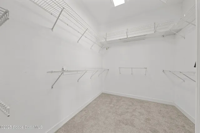 a spacious bathroom with a shower