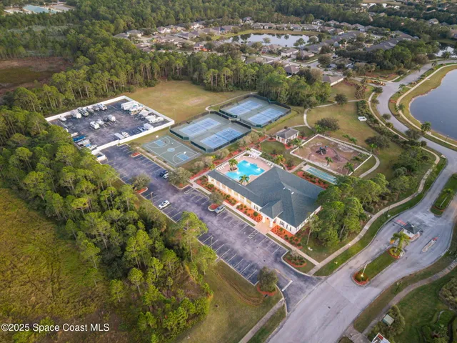 a view of a wooden door and outdoor space