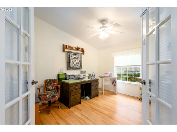 a open kitchen with stainless steel appliances granite countertop a stove and refrigerator