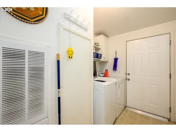 a view of kitchen and utility room