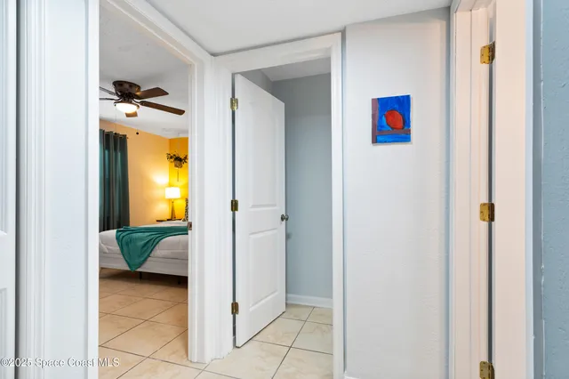 a en suite bathroom with a sink and mirror