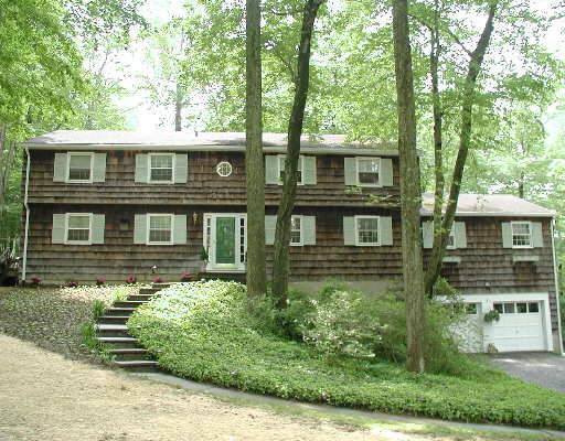 18 Cobblers Lane Ridgefield, CT 06877 - Photo 1 of 1 a front view of a house with garden