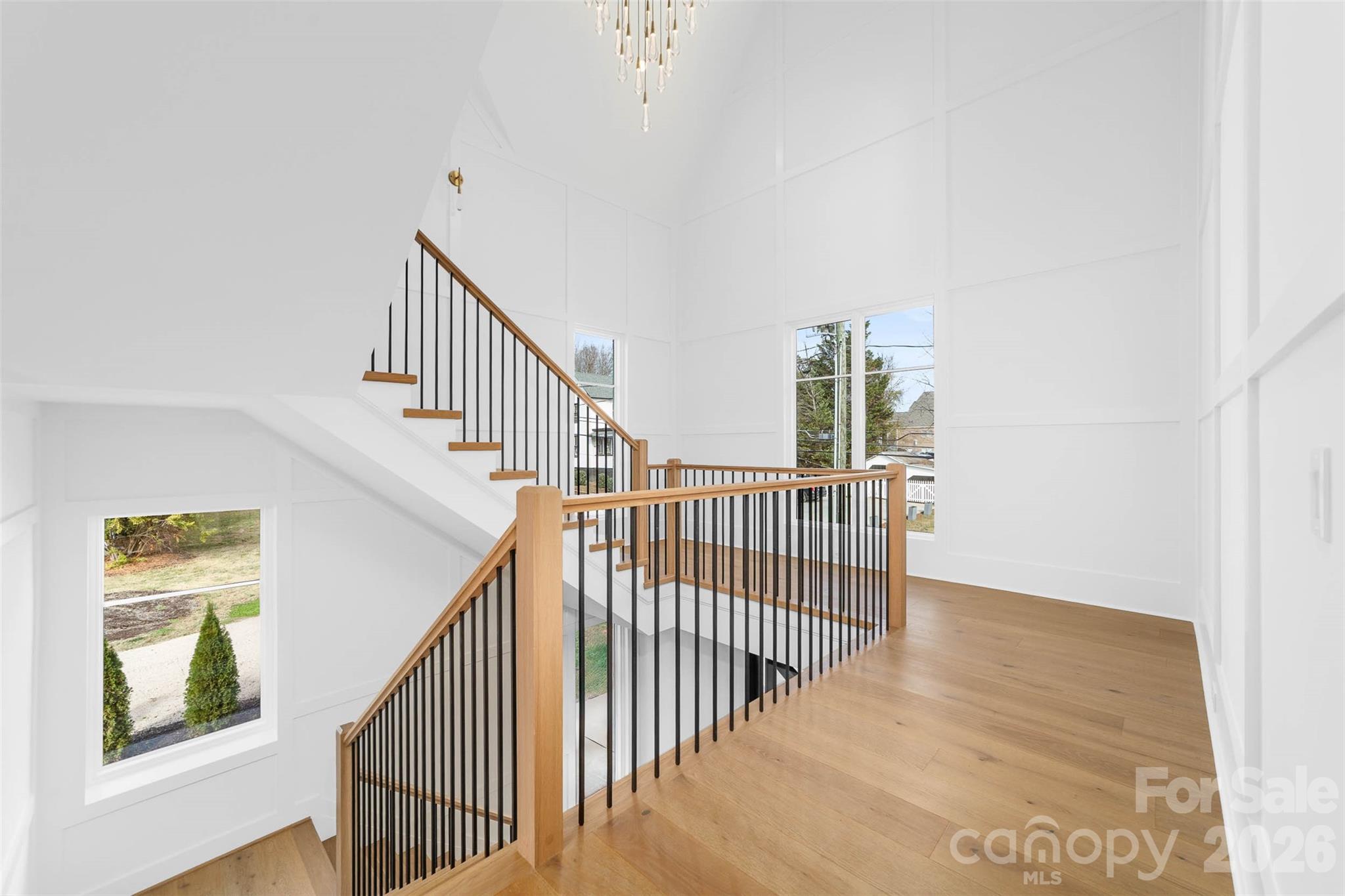 216 Walnut Street Davidson, NC 28036 - Photo 27 of 48 a view of staircase with railing and a window