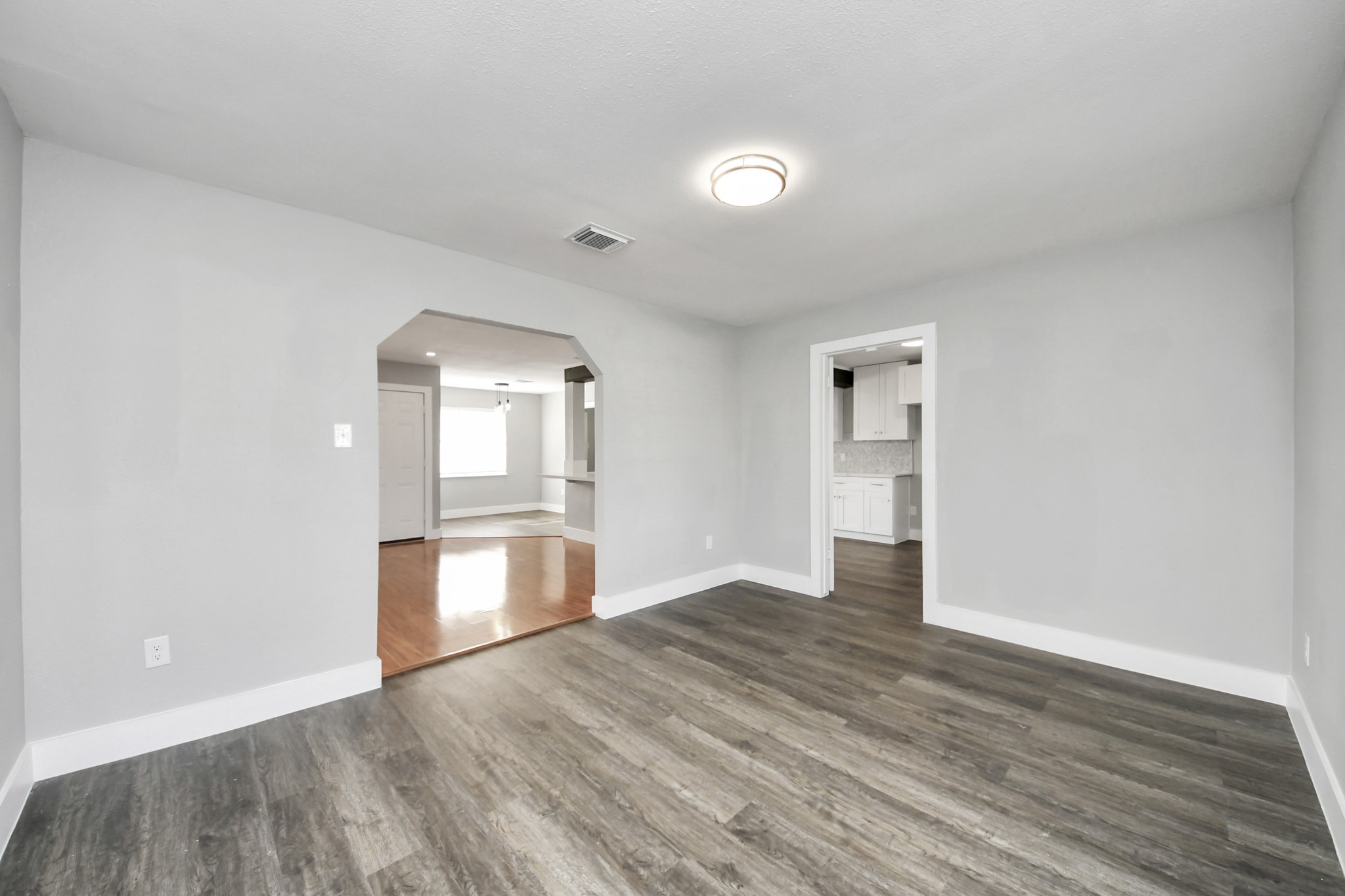 15423 Ridingwood Drive Houston, TX 77489 - Photo 13 of 43 a view of empty room with wooden floor and fan