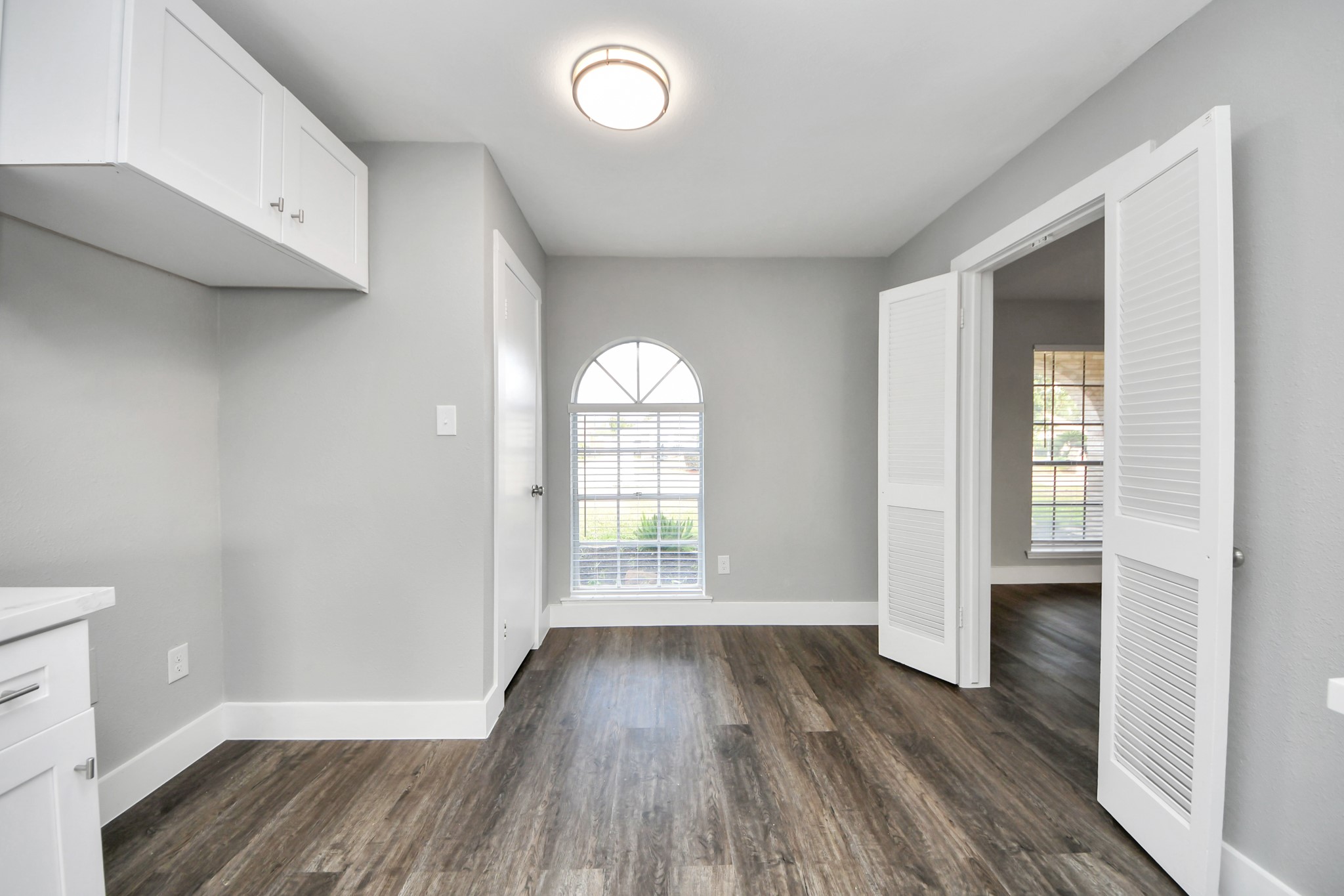 15423 Ridingwood Drive Houston, TX 77489 - Photo 15 of 43 wooden floor in an empty room with a window