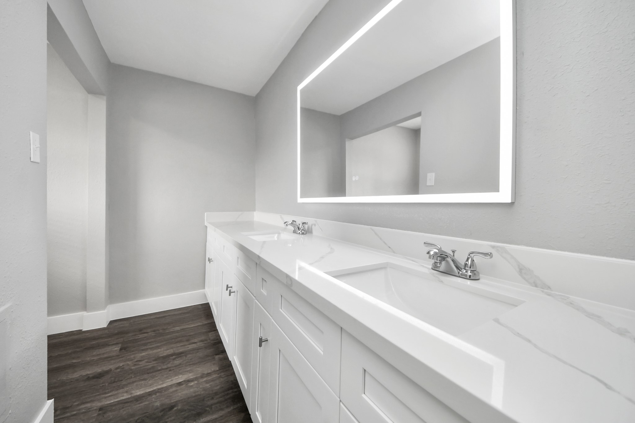 15423 Ridingwood Drive Houston, TX 77489 - Photo 28 of 43 a bathroom with a double vanity sink and a mirror