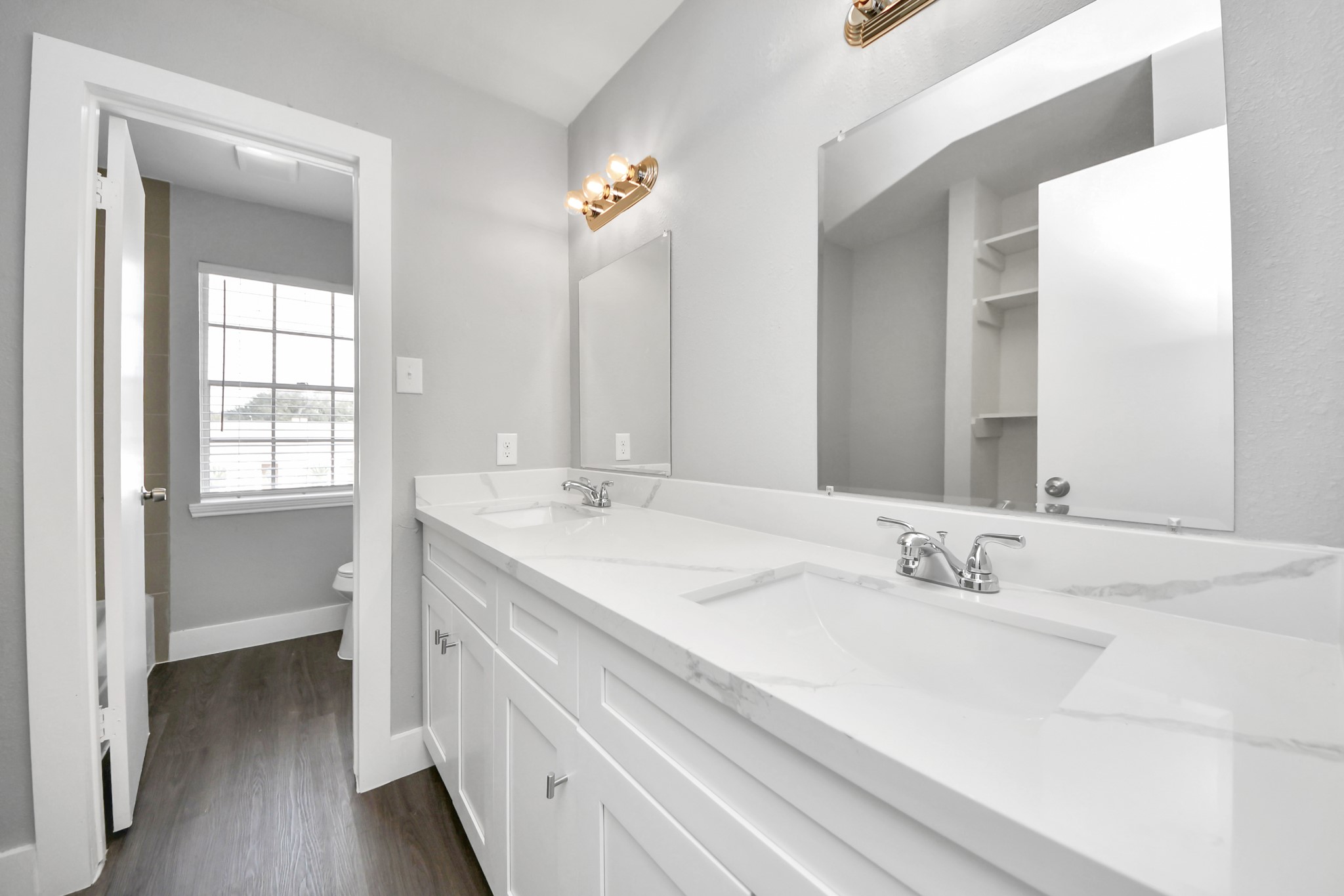 15423 Ridingwood Drive Houston, TX 77489 - Photo 33 of 43 a bathroom with a sink double vanity and a mirror