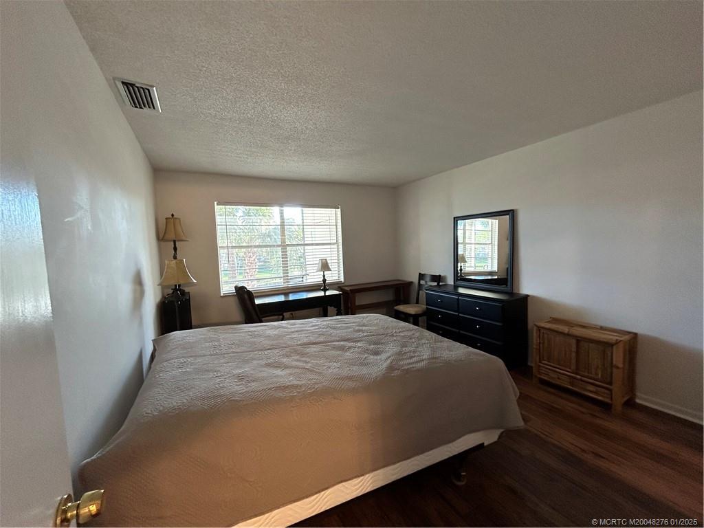 1997 Southwest Palm City Road, Unit 48H Stuart, FL 34994 - Photo 19 of 49 Master bedroom