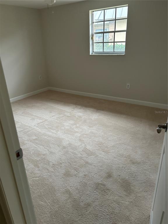 4422 Sunstate Drive New Port Richey, FL 34652 - Photo 13 of 19 an empty room with a window