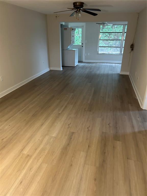 4422 Sunstate Drive New Port Richey, FL 34652 - Photo 3 of 19 a view of empty room with windows