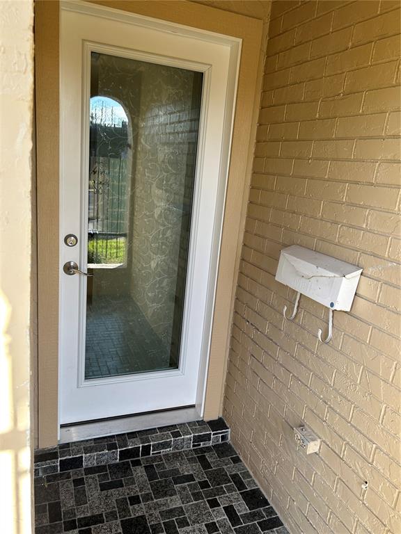 4422 Sunstate Drive New Port Richey, FL 34652 - Photo 4 of 19 a bathroom with a toilet and a shower