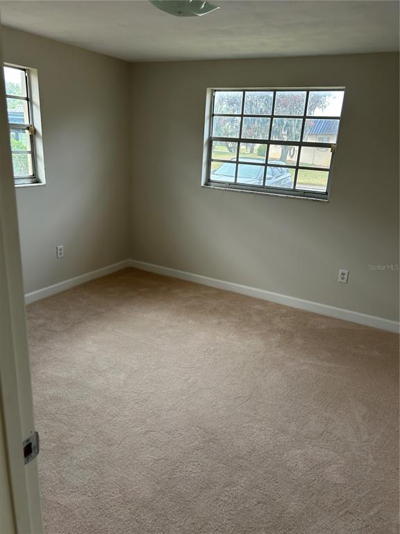 4422 Sunstate Drive New Port Richey, FL 34652 - Photo 10 of 19 an empty room with a window