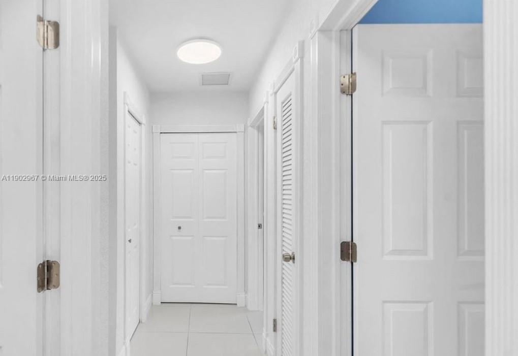 16891 Southwest 277th Street Homestead, FL 33031 - Photo 22 of 47 a bathroom with a shower