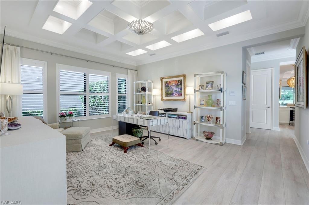 4478 Caldera Circle Naples, FL 34119 - Photo 16 of 50 Huge Club Room is adorned by spectacular ceiling treatments with crown moldings and mood lighting. This room can be used for Bedroom 4, Study, Hobbies, or Kids Playroom!