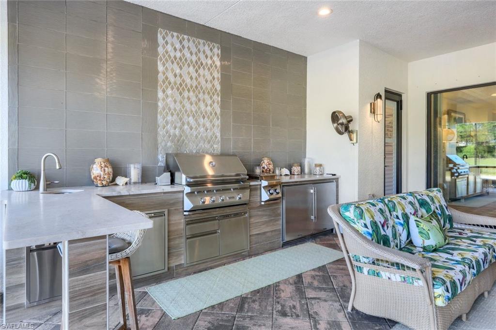 4478 Caldera Circle Naples, FL 34119 - Photo 32 of 50 Put the steaks on the main grill and the kabobs on the second grill, this is the best of Florida living