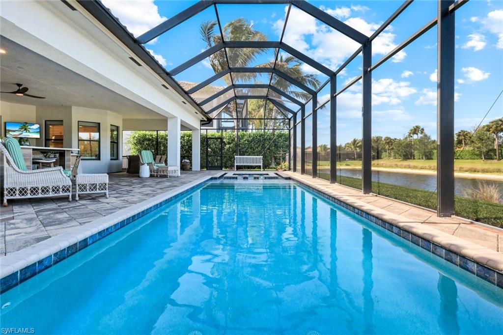 4478 Caldera Circle Naples, FL 34119 - Photo 36 of 50 The pool is irresistable with sparkling blue waters and an integrated spa to end the day!