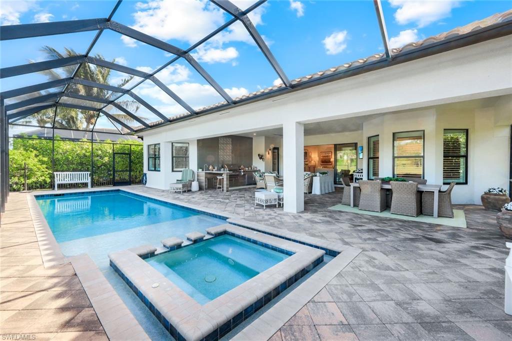 4478 Caldera Circle Naples, FL 34119 - Photo 38 of 50 Once cannot overstate the advantage of this Extended Lanai for space to enjoy the outdoors with both shade and sunshine