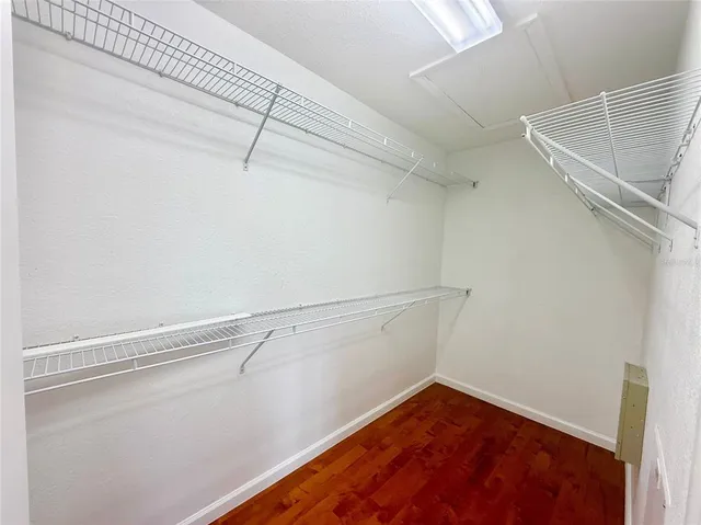 a view of a room with racks on the wall