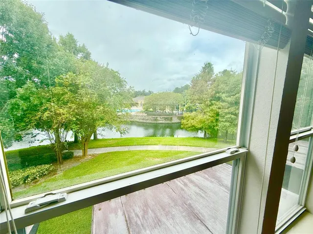 a view of outdoor space with swimming pool