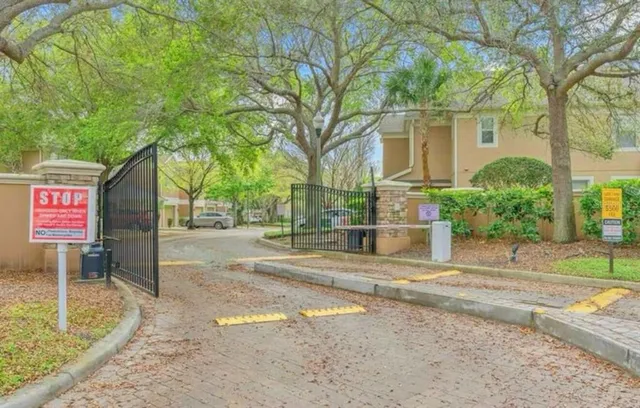 a view of a street with houses on both side