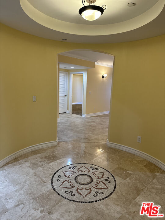 122 North Clark Drive, Unit 105 West Hollywood, CA 90048 - Photo 3 of 28 a view of a livingroom with a rug