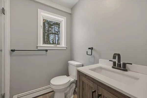 a bathroom with a sink and a toilet