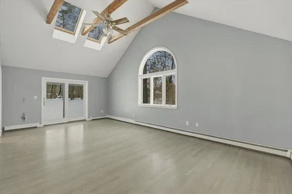 an empty room with windows