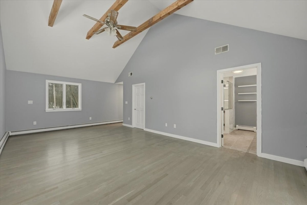 98 Walnut Street Halifax, MA 02338 - Photo 20 of 36 a view of an empty room with a window