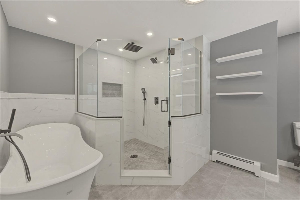 98 Walnut Street Halifax, MA 02338 - Photo 22 of 36 a bathroom with a shower sink and mirror