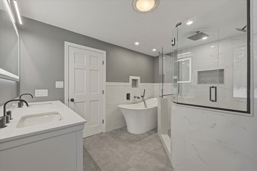98 Walnut Street Halifax, MA 02338 - Photo 23 of 36 a large white kitchen with a sink a toilet and a mirror