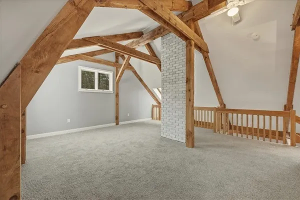 a view of an empty room with stairs