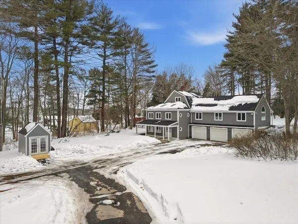 a house with trees in front of it
