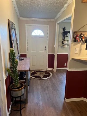 a room with furniture and wooden floor