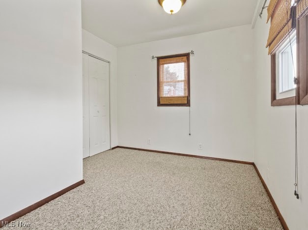 284 Wilson Street Struthers, OH 44471 - Photo 8 of 16 Empty room with carpet floors and baseboards