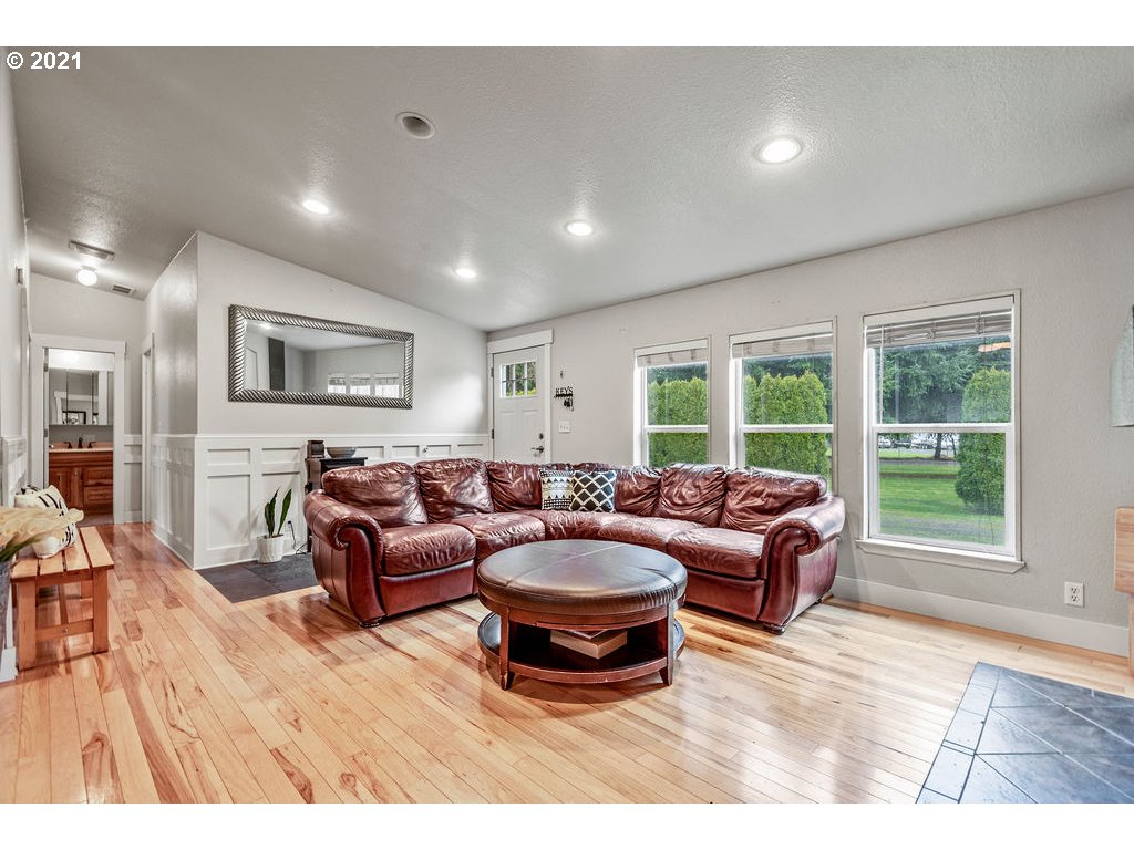 109 Highland Road Winlock, WA 98596 - Photo 13 of 28 a living room with furniture and a large window