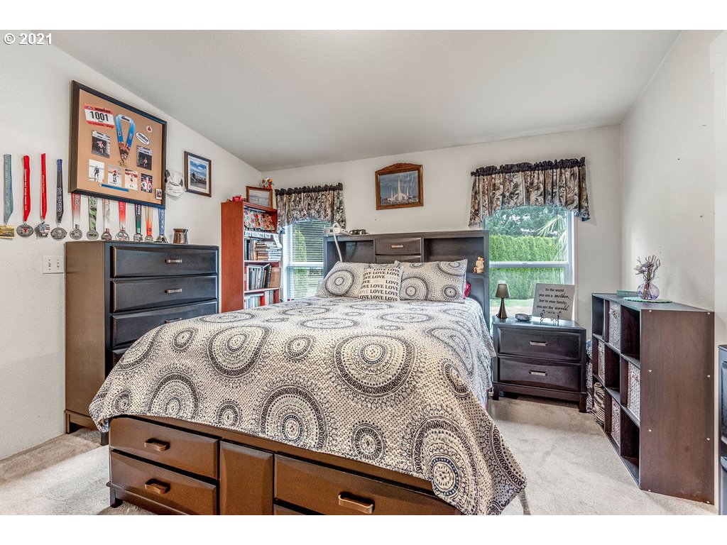 109 Highland Road Winlock, WA 98596 - Photo 26 of 28 a bedroom with a bed and a window