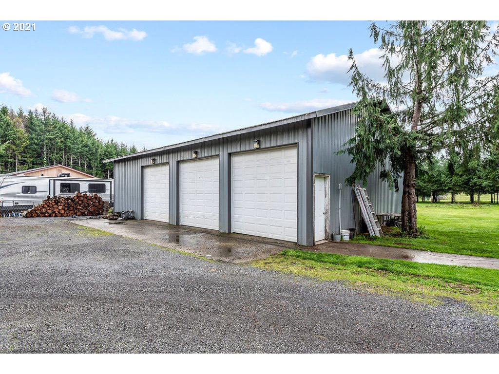 109 Highland Road Winlock, WA 98596 - Photo 8 of 28 a house view with a backyard space