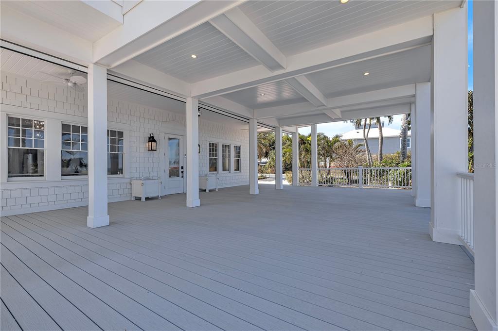 8241 Main Street Bokeelia, FL 33922 - Photo 18 of 100 a view of livingroom with furniture and floor to ceiling window
