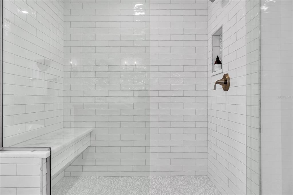 8241 Main Street Bokeelia, FL 33922 - Photo 69 of 100 a bathroom with a shower