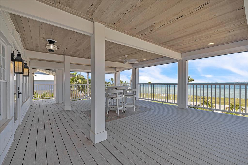 8241 Main Street Bokeelia, FL 33922 - Photo 80 of 100 a view of a room with wooden floor