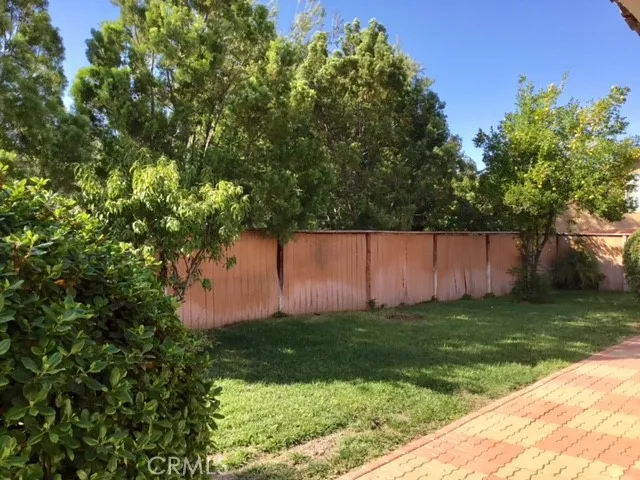 a view of a backyard with green space