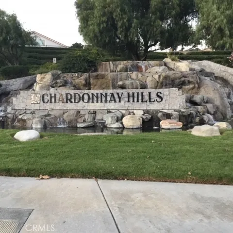 a view of a garden with houses