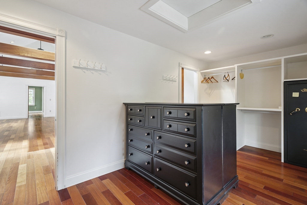 107 Wareham Street Carver, MA 02330 - Photo 16 of 25 a view of walk in closet with clothes and shoes