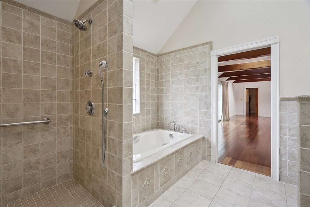 107 Wareham Street Carver, MA 02330 - Photo 18 of 25 a bathroom with a bathtub and a shower