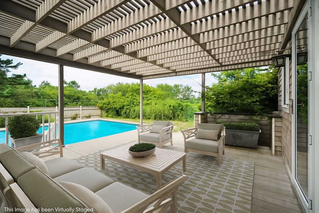 107 Wareham Street Carver, MA 02330 - Photo 22 of 25 a view of a patio with couches table and chairs