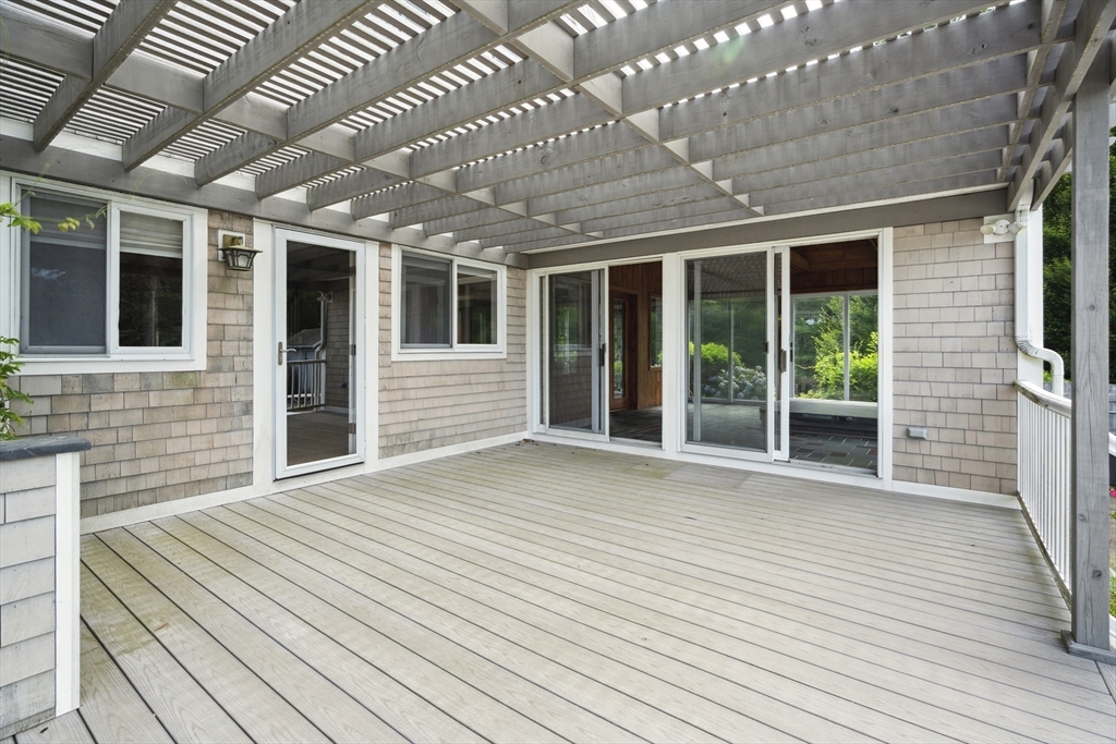 107 Wareham Street Carver, MA 02330 - Photo 24 of 25 a view of backyard with large windows