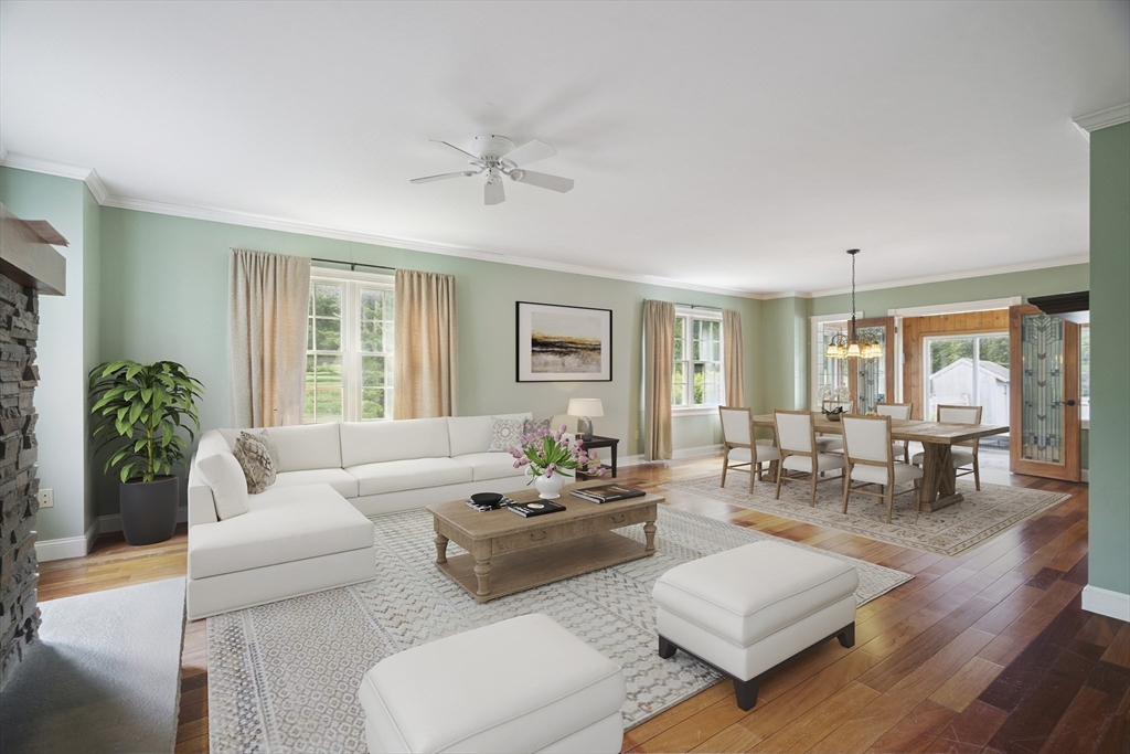 107 Wareham Street Carver, MA 02330 - Photo 9 of 25 a living room with furniture and wooden floor